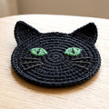 Black Cat Coaster — the finished object this pattern is designed to produce