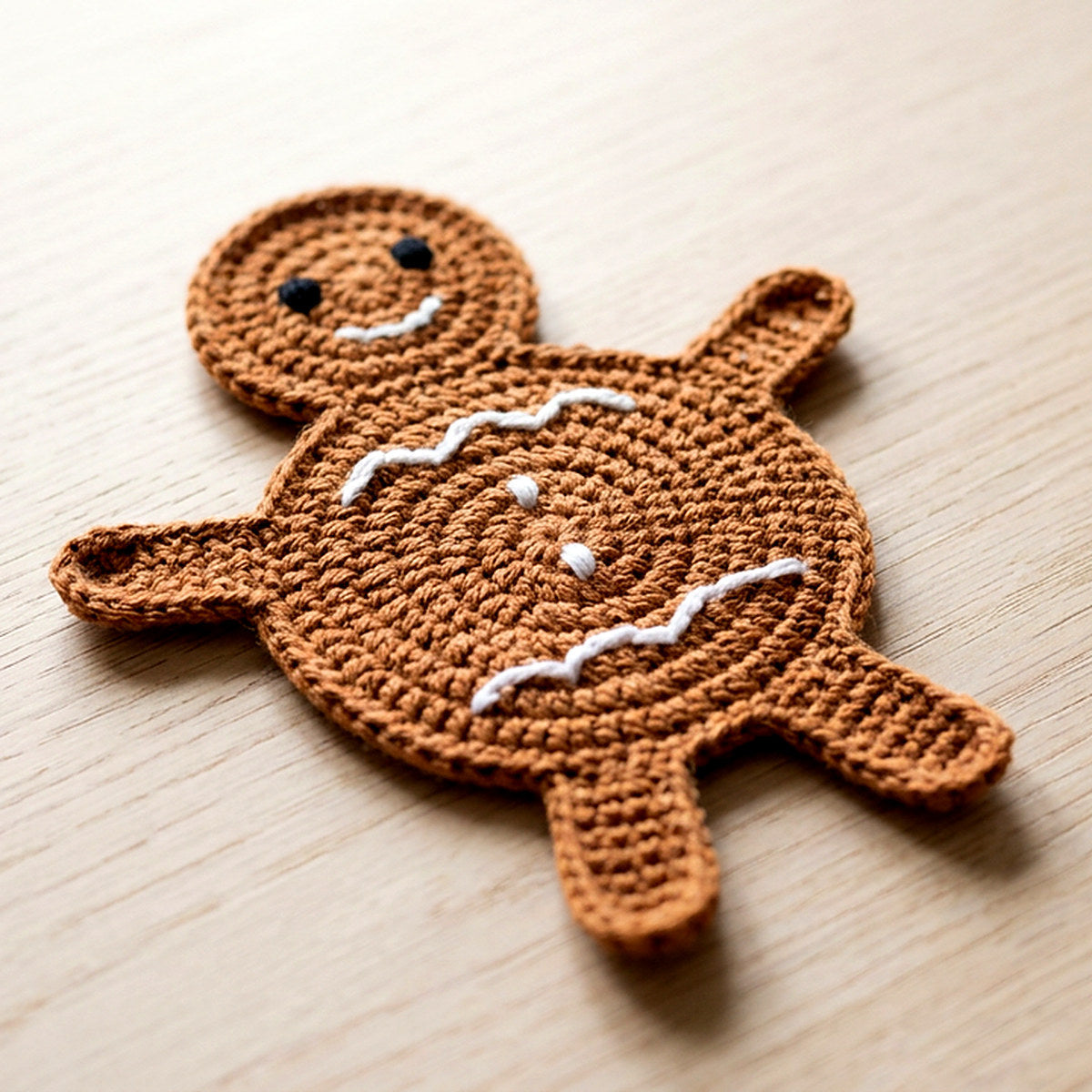 Gingerbread Person Coaster — the finished object this pattern is designed to produce
