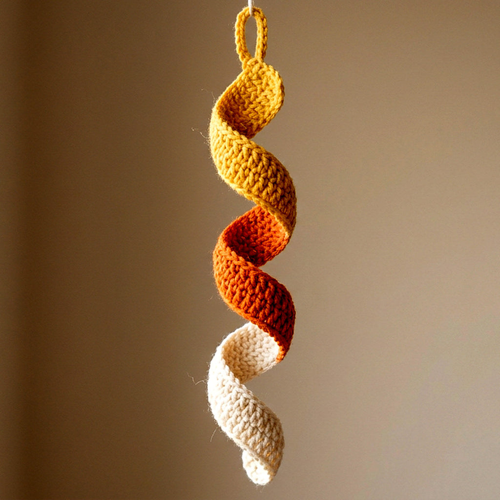 Candy Corn Spiral Ornament — the finished object this pattern is designed to produce