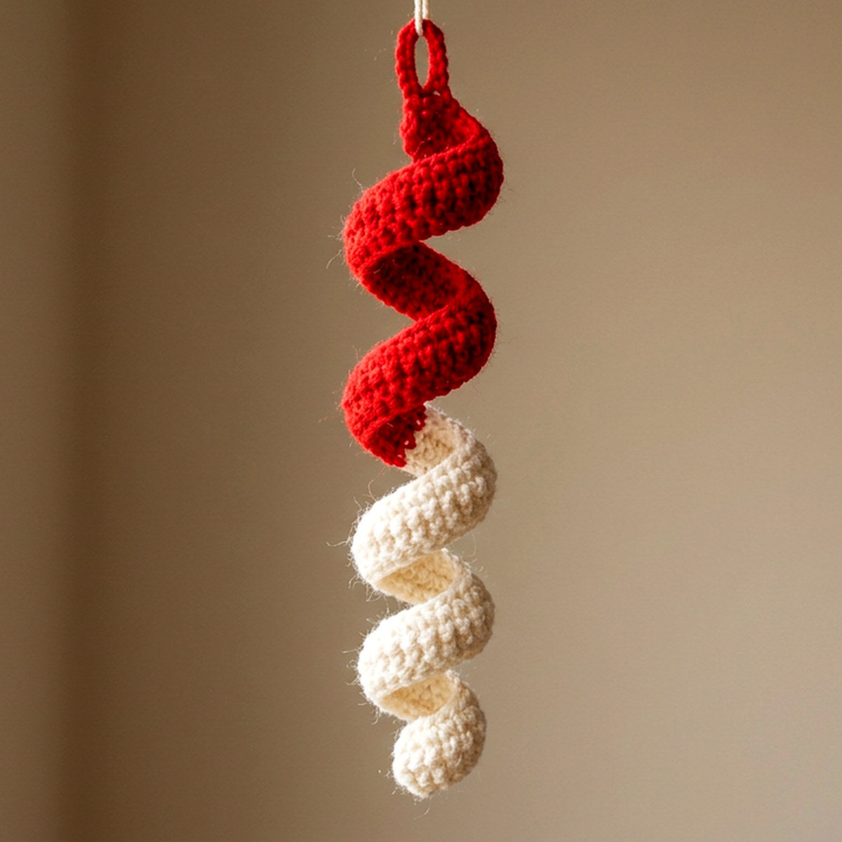 Candy Cane Spiral Ornament — the finished object this pattern is designed to produce