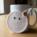Ghost Mug Hugger — the finished object this pattern is designed to produce