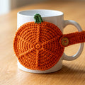 Pumpkin Mug Hugger — the finished object this pattern is designed to produce