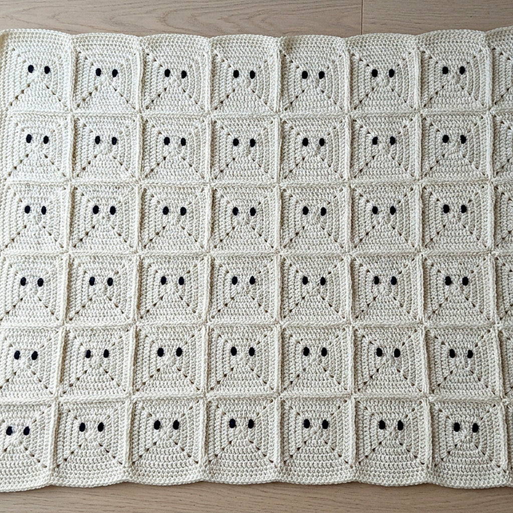 The ghost motif blanket from the Kroche Halloween set, joined as you go